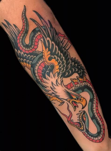 eagle with snake tattoo meaning|More.